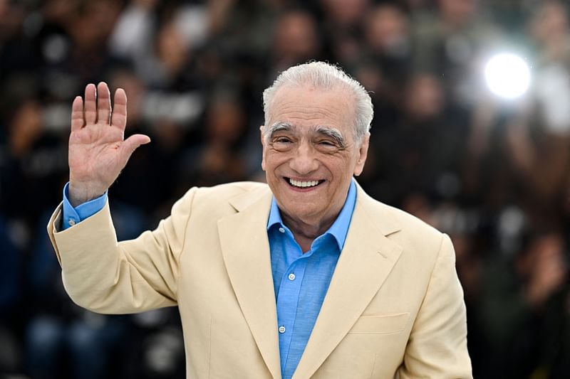 US director Martin Scorsese waves during a photocall for the film "Killers of the Flower Moon" at the 76th edition of the Cannes Film Festival in Cannes, southern France, on 21 May, 2023.