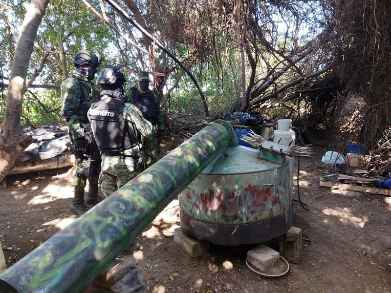 Mexican soldiers stand next to a drug lab seized in Culiacan, Mexico, in this handout picture distributed to Reuters on 15 February, 2023