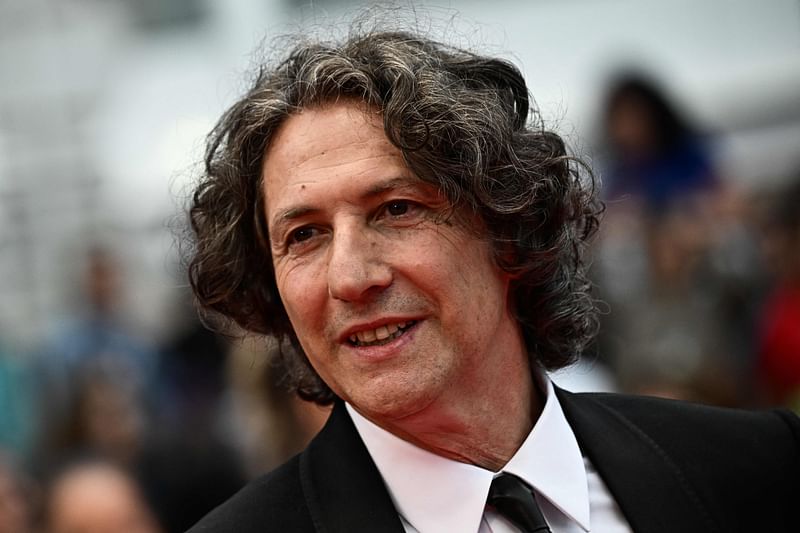 British director Jonathan Glazer arrives for the screening of the film 'The New Boy' during the 76th edition of the Cannes Film Festival in Cannes, southern France, on 19 May, 2023.