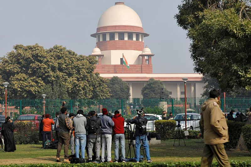 Television journalists are seen outside the premises of the Supreme Court in New Delhi, India, on 22 January, 2020.