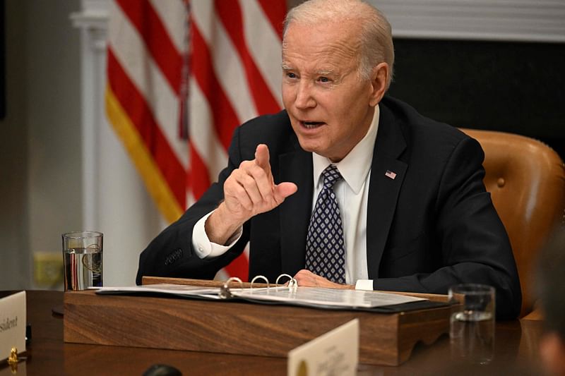 In this file photo taken on May 05, 2023, US President Joe Biden meets his 'Investing in America Cabinet' in the Roosevelt Room of the White House in Washington, DC. US President Joe Biden on May 7, 2023, denounced the "senseless acts of violence" by a Texas shooter who a day earlier killed eight people in a shopping mall massacre