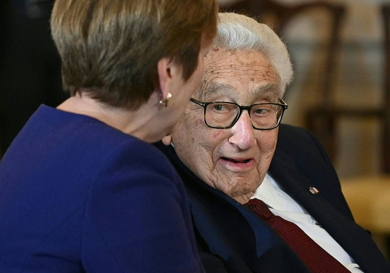 Former US Secretary of State Henry Kissinger talks with Deborah Rutter, President of The John F. Kennedy Center, during a luncheon at the US State Department in Washington, DC, on 1 December, 2022