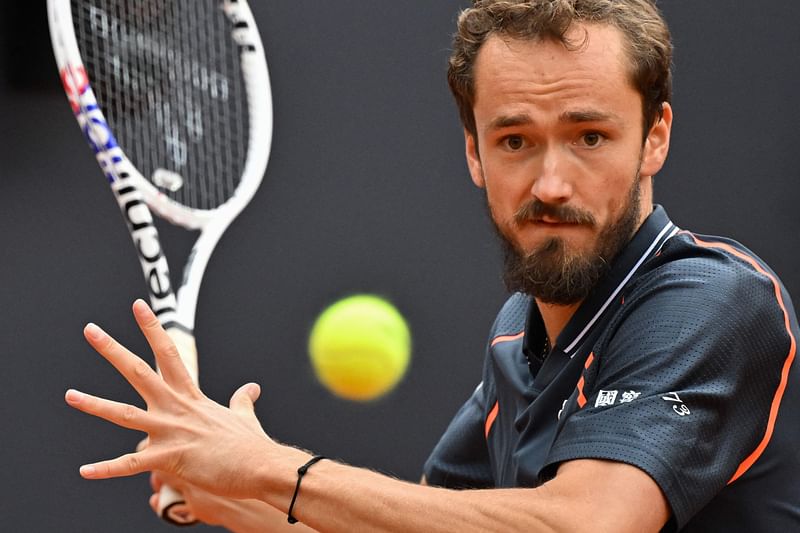 Russia's Daniil Medvedev returns to Germany's Yannick Hanfmann during their quarterfinals of the Men's ATP Rome Open tennis tournament at Foro Italico in Rome on 18 May 2023