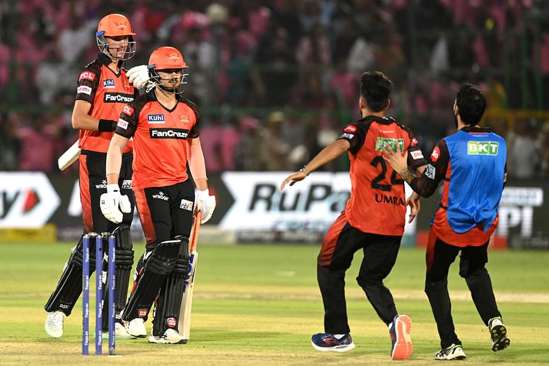 Sunrisers Hyderabad's players charge towards Abdul Samad after the dramatic last-ball win over Rajasthan Royals in their Indian Premier League match at the Sawai Mansingh Stadium in Jaipur on 7 May 2023