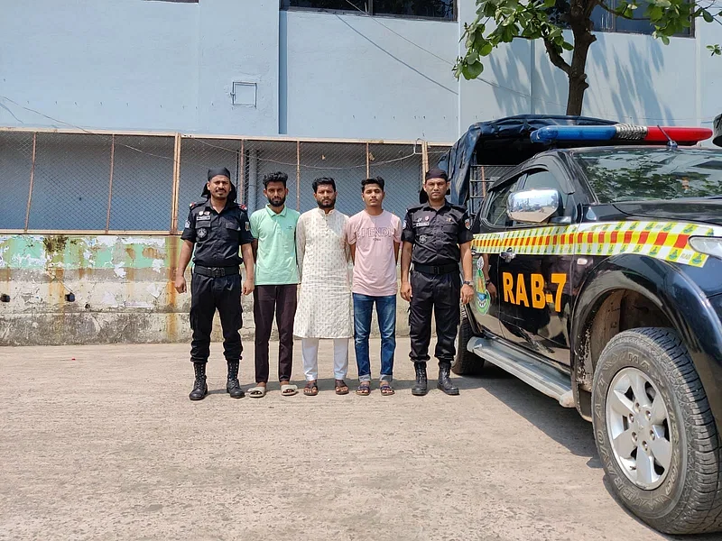 Two RAB-7 members are seen with the three arrested