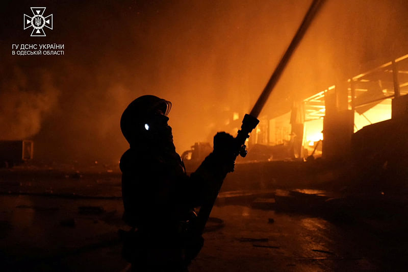 A firefighter works at the site where storage facilities were heavily damaged by a Russian missile strike, amid Russia's attack on Ukraine, in Odesa region, Ukraine May 8, 2023