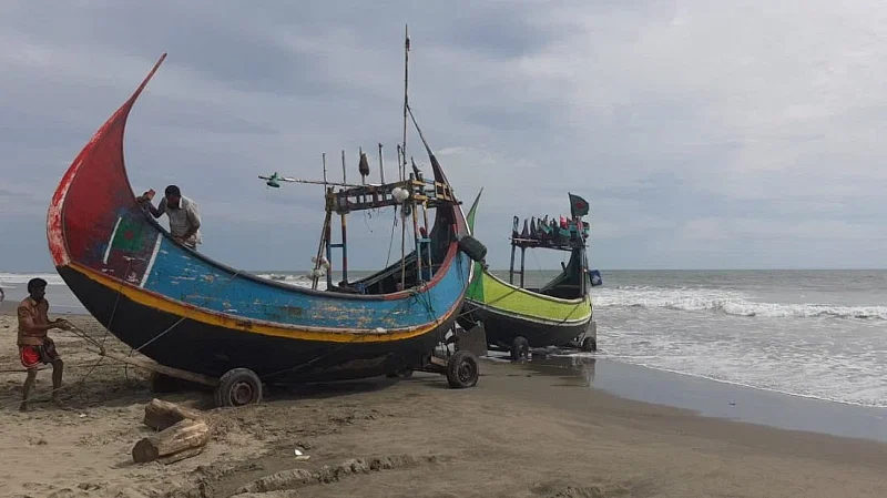 The sampans are being taken to shelter from the sea.