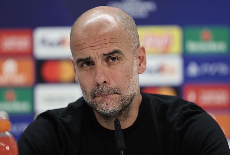 Manchester City's Spanish manager Pep Guardiola looks on during a press conference of Manchester City on the eve of their UEFA Champions League semi-final second leg match against Real Madrid CF at the Santiago Bernabeu stadium in Madrid on 8 May 2023