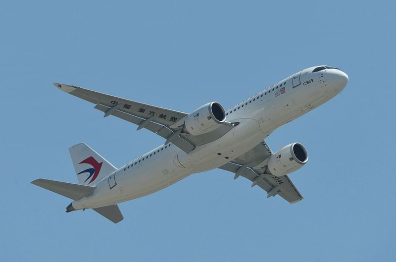 China's first domestically produced passenger jet C919 flies during its first commercial flight from Shanghai to Beijing, in Shanghai on 28 May, 2023