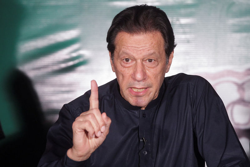 Pakistan's former Prime Minister Imran Khan, gestures as he speaks to the members of the media at his residence in Lahore, Pakistan May 18, 2023