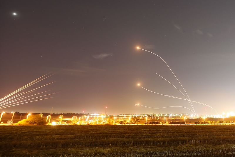 Israel's Iron Dome air defence system operates in Sderot to intercept rockets launched from Gaza City, on 10 May, 2023