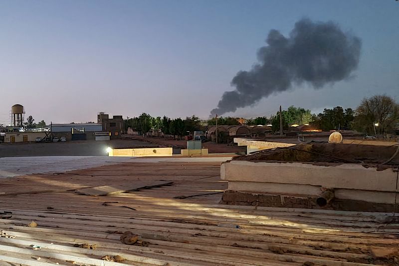 Smoke billows in Khartoum amid ongoing fighting between the forces of two rival generals in Sudan on May 6, 2023. Air strikes battered Sudan's capital on May 6, as fighting entered a fourth week only hours before the warring parties are to meet in Saudi Arabia for their first direct talks