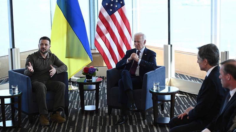 Ukraine's president Volodymyr Zelensky (L) and US President Joe Biden take part in a bilateral meeting during the G7 Leaders' Summit in Hiroshima on 21 May, 2023