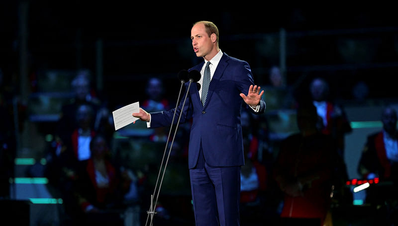 Britain's Prince William speaks on stage during the Coronation Concert on May 7, 2023 in Windsor, Britain