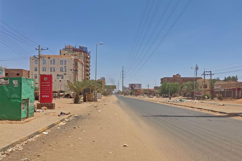 A deserted street is pictured in Khartoum on 1 May 2023 as deadly clashes between rival generals' forces have entered their third week. The top United Nations humanitarian official is heading to the Sudan region due to the "rapidly deteriorating humanitarian crisis" in the conflict-racked country, the UN chief said.