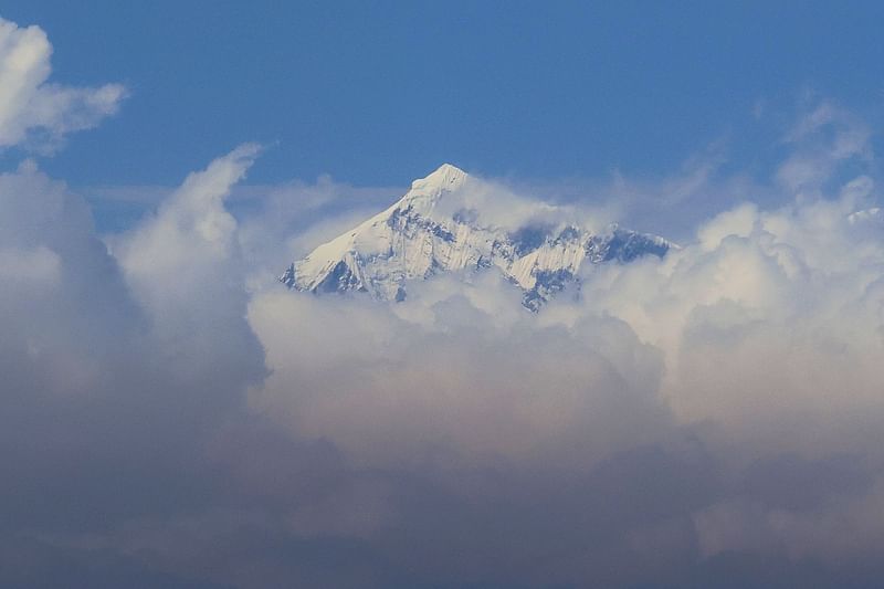 In this file photo taken on 7 March, 2023, an aerial picture taken midair from an helicopter shows the summit of Mount Everest