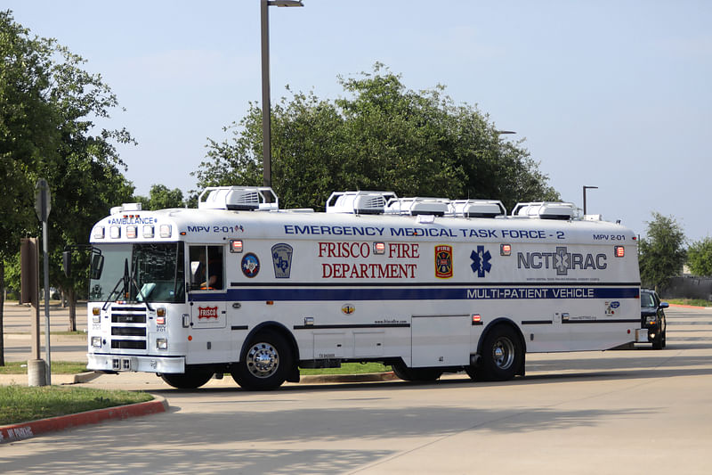 A City of Frisco emergency, multi-patient bus pulls into the parking lot of the scene of a shooting at Allen Premium Outlets on May 6, 2023 in Allen, Texas