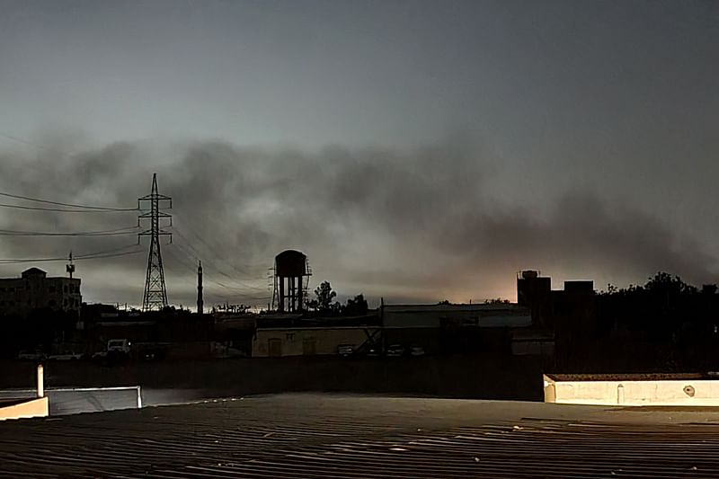 Smoke billows in Khartoum amid ongoing fighting between the forces of two rival generals, on 11 May, 2023