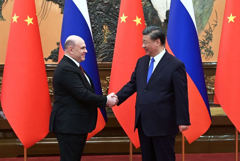 Russian Prime Minister Mikhail Mishustin meets with China's President Xi Jinping in Beijing on 24 May, 2023