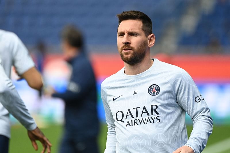 In this file photo taken on 30 April 2023, Paris Saint-Germain's Argentine forward Lionel Messi looks on as he warms up prior to the French Ligue 1 match between Paris Saint-Germain and FC Lorient at The Parc des Princes Stadium in Paris