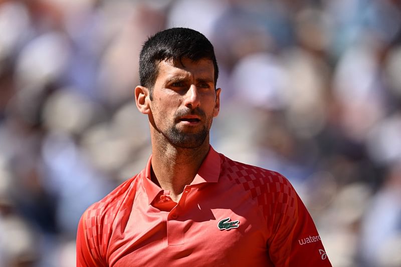 Serbia's Novak Djokovic looks on as he plays against US Aleksandar Kovacevic during their men's singles match on day two of the French Open at the Court Philippe-Chatrier in Paris on 29 May 2023