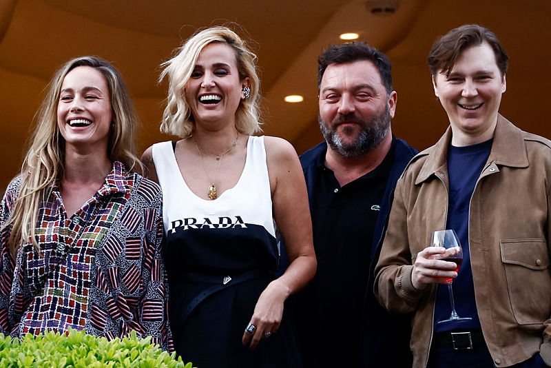 The 76th Cannes Film Festival - Jury dinner - Cannes, France, 15 May, 2023. Jury members Brie Larson, Julia Ducournau, Denis Menochet and Paul Dano stand on a balcony at the Hotel Martinez on the eve of the opening of the Cannes Film Festival.