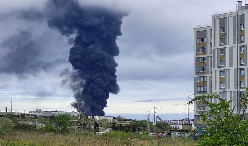 Smoke rises over a fuel tank following an alleged drone attack in Sevastopol, Crimea, on 29 April, 2023