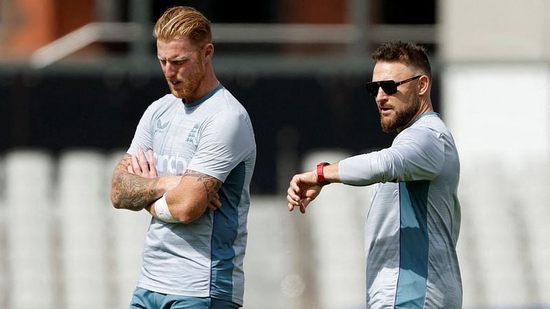 England’s Ben Stokes talks to head coach Brendon McCullum during practice at Emirates Old Trafford, Manchester, Britain on 23 August, 2022