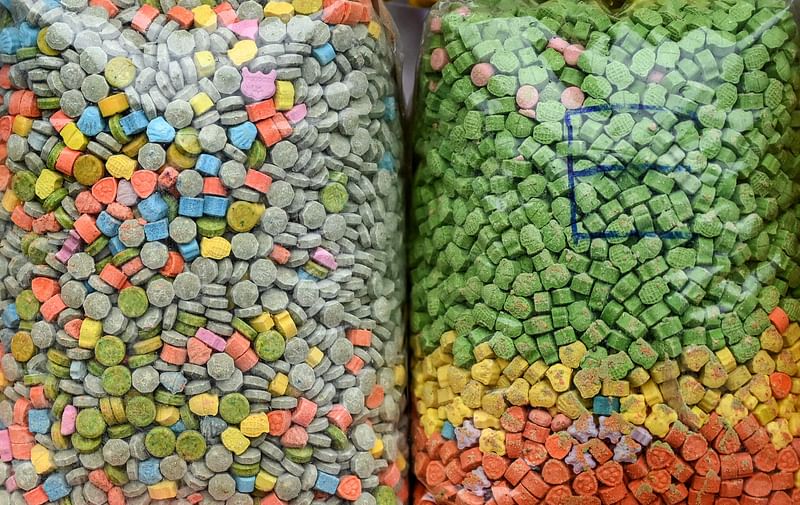 Packs of illegal ketamine are seen before a destruction ceremony to mark the "International Day against Drug Abuse and Illicit Trafficking" in Yangon on June 26, 2023. Myanmar junta authorities said they torched almost half a billion dollars worth of illegal drugs on June 26, 2023, but warned they were failing to stop a surge in production and trafficking of narcotics