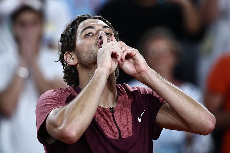 US Taylor Fritz gestures after winning against France's Arthur Rinderknech at the end of their men's singles match on day five of the Roland-Garros Open tennis tournament at the Court Suzanne-Lenglen in Paris on 1 June 2023