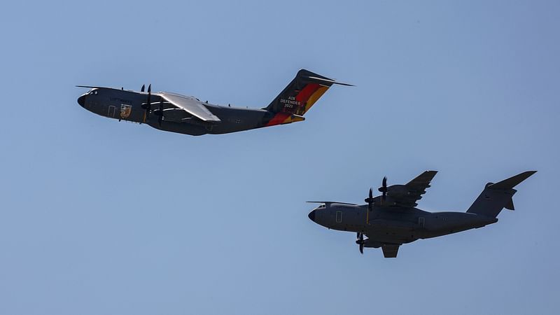 Two Airbus A400M military aircrafts of the German Armed Forces Bundeswehr approach during the Air Defender Exercise 2023 in the military air base in Wunstorf, northern Germany, on 12 June, 2023