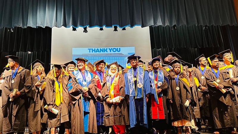 Graduates, faculty members and officials of Washington University of Science and Technology on stage during the graduation ceremony