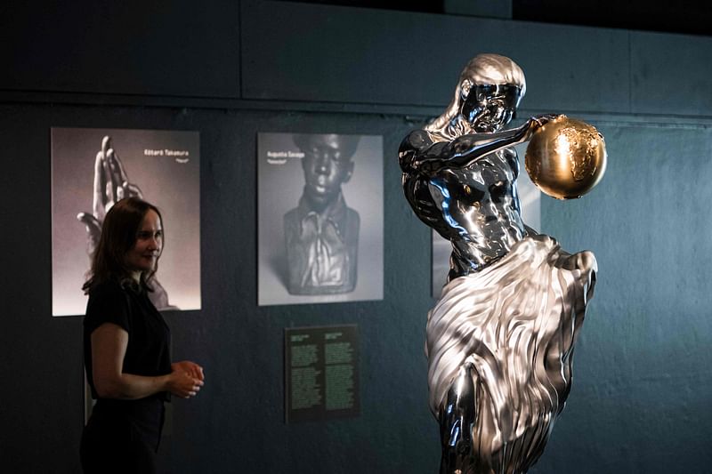 The world's first Al sculpture "The Impossible Statue", is displayed at the Tekniska museum in Stockholm on 8 June, 2023. Inspired by the works of five masters, including Michelangelo, Rodin and Takamura, a Swedish museum is exhibiting a statue created exclusively using artificial intelligence (AI), dubbed the "Impossible Statue".