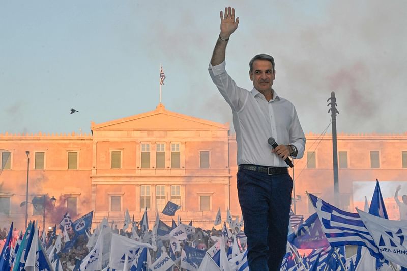 Greek former prime minister and leader of Greece's conservative party New Democracy, Kyriakos Mitsotakis, speaks to his party's supporters during his last pre-election speech in Athens on June 23, 2023, two days ahead of general elections