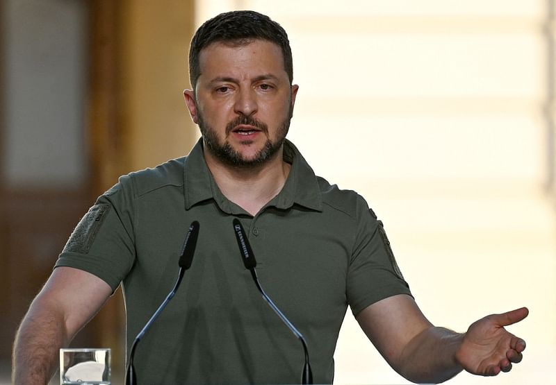 Ukraine's President Volodymyr Zelensky gestures as he addresses media after talks with African Presidents in Kyiv on 16 June, 2023