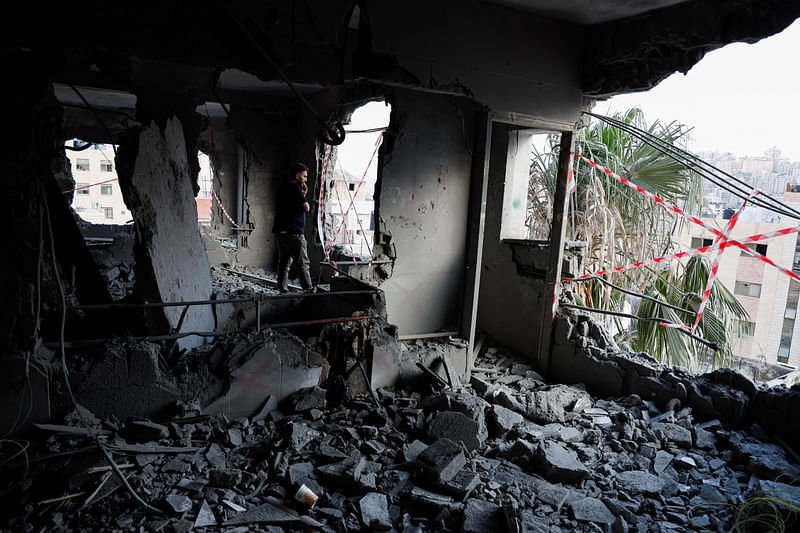 A man inspects a house demolished by the Israeli army in Nablus, in the Israeli-occupied West Bank, June 15, 2023