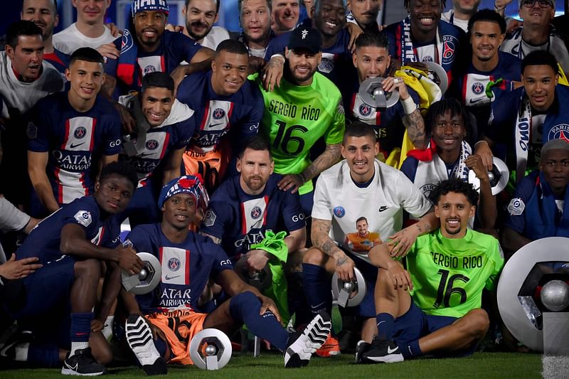 Paris Saint-Germain players celebrate their French L1 championship during the 2022-2023 Ligue1 trophy ceremony following the L1 football match between Paris Saint-Germain (PSG) and Clermont Foot 63 at the Parc des Princes Stadium in Paris on 3 June, 2023