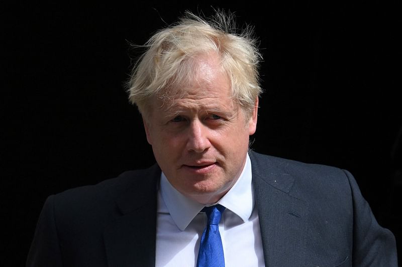 Britain's then prime minister Boris Johnson leaves 10 Downing Street in central London on 6 July, 2022 to head to the Houses of Parliament for the weekly Prime Minister's Questions (PMQs) session. Johnson deliberately misled MPs over Covid lockdown-breaking parties in Downing Street when he was prime minister, a UK parliament committee ruled on 15 June, 2023