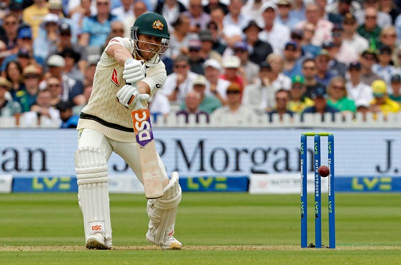 Australia's David Warner plays a shot for four runs on day one of the second Ashes cricket Test match between England and Australia at Lord's cricket ground in London, on 28 June, 2023