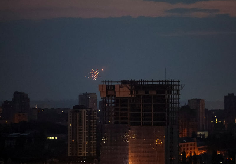 An explosion of a drone is seen in the sky over the city during a Russian drone strike, amid Russia's attack on Ukraine, in Kyiv, Ukraine June 20, 2023