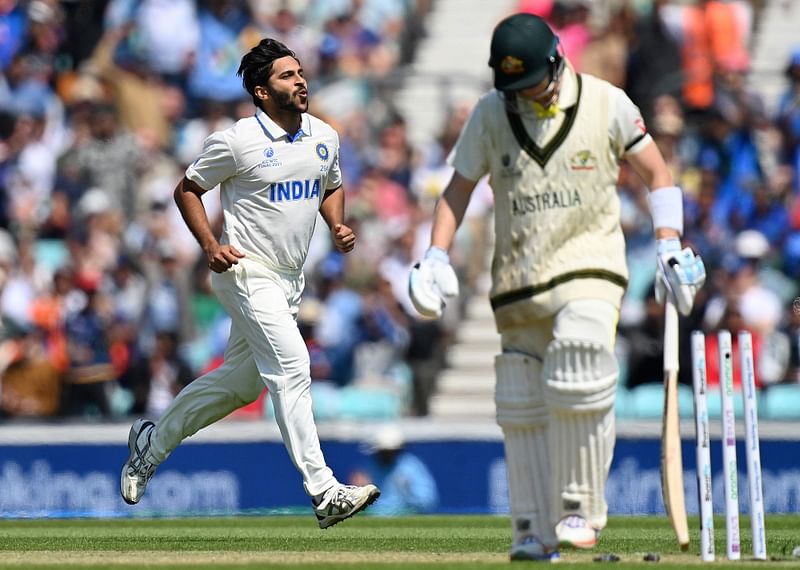 India's Shardul Thakur celebrates dismissing Australia's Steve Smith for 121 runs during day 2 of the ICC World Test Championship final between Australia and India at The Oval in London on 8 June 2023