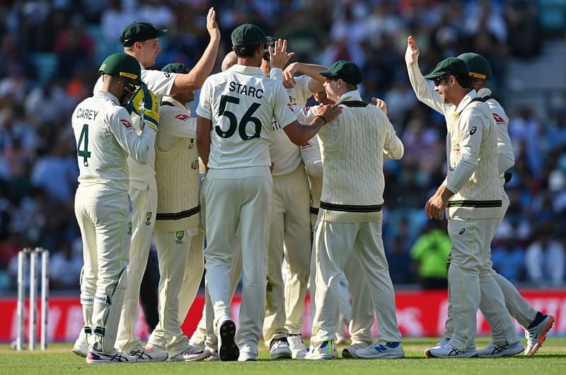 Australia’s Steve Smith (3R) celebrates with teammates after catching the ball to take the wicket India’s Ravindra Jadeja (unseen) for 48 runs during day 2 of the ICC World Test Championship cricket final match between Australia and India at The Oval, in London, on 8 June, 2023