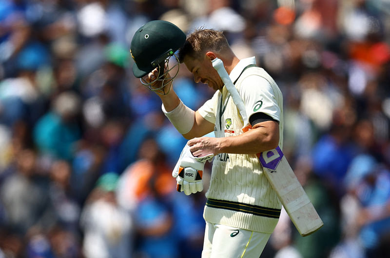 Australia's David Warner walks after losing his wicket in the morning session of Day 1 of the ICC World Test Championship final against India at The Oval in London, Britain on 7 June 2023