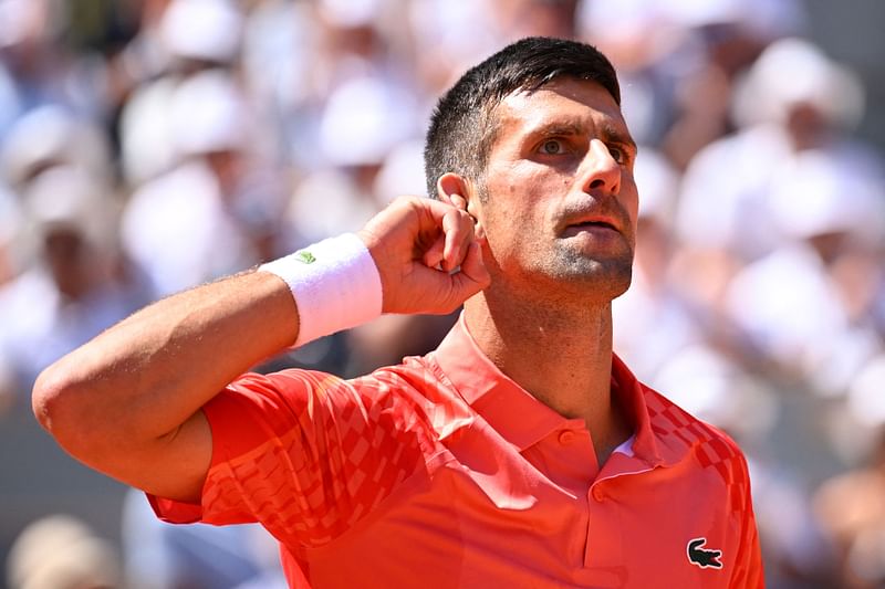 Serbia's Novak Djokovic gestures as he plays against Peru's Juan Pablo Varillas during their men's singles match on day eight of the Roland-Garros Open tennis tournament at the Court Philippe-Chatrier in Paris on 4 June, 2023