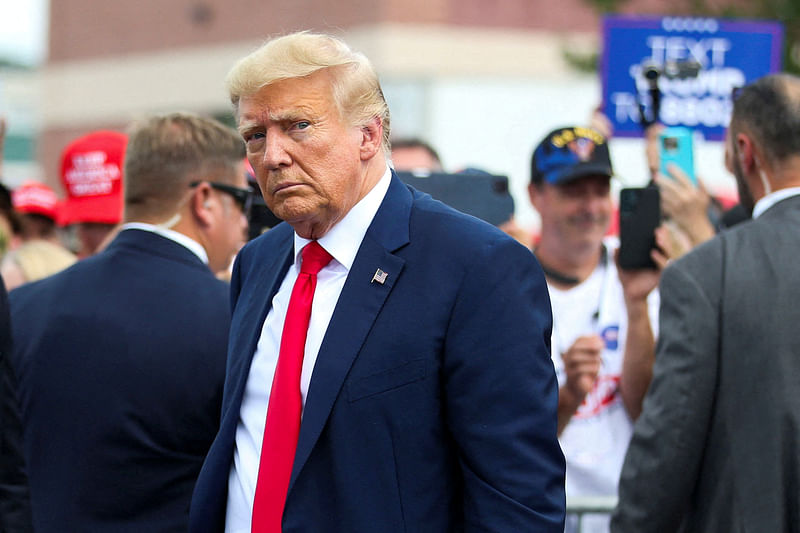 Former US President and Republican presidential candidate Donald Trump leaves the opening of his campaign headquaters in Manchester, New Hampshire, US, on 27 June, 2023