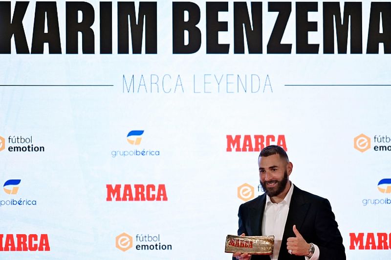 Real Madrid's French forward Karim Benzema poses after receiving the MARCA Leyenda award in Madrid on 1 June 2023