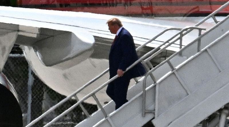 Former US president Donald Trump disembarks 'Trump Force One' at Miami International Airport in Miami, Florida, on 12 June, 2023