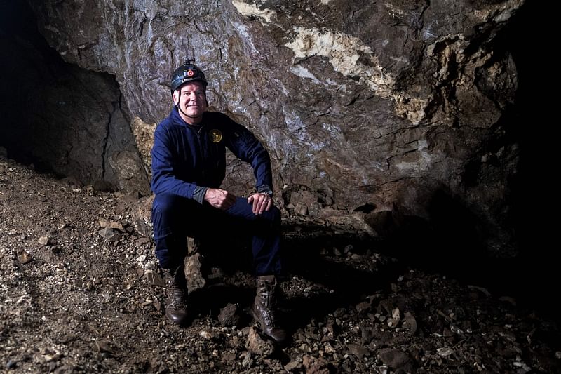 Professor Lee Berger, palaeontologist, explorer and member of The National Geographic Society, poses for a portrait in the Rising Star caves system in The Cradle of Human Kind, on 11 May, 2023