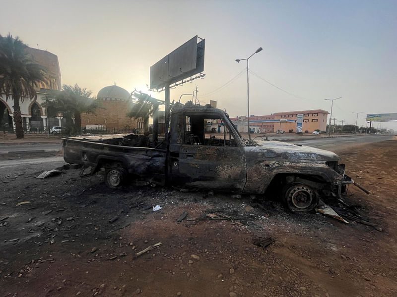 A burned vehicle is seen in Khartoum, Sudan April 26, 2023