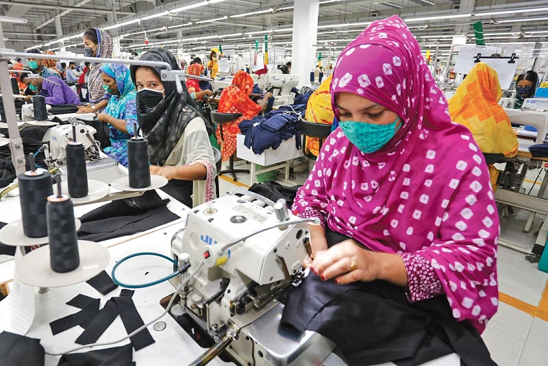 A woman works at an apparel factory